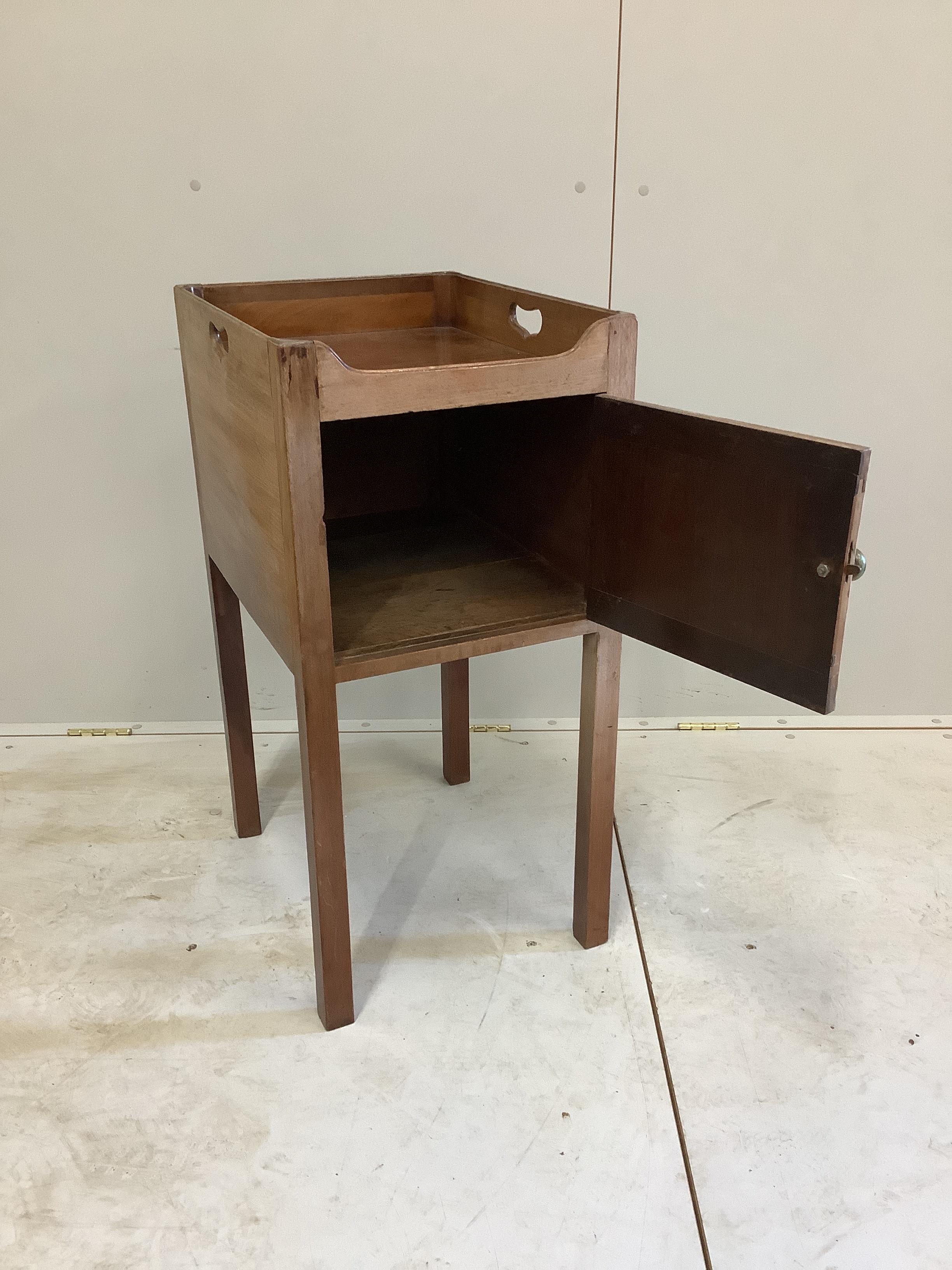 A George III faded mahogany tray top bedside cabinet, width 38cm, depth 48cm, height 79cm